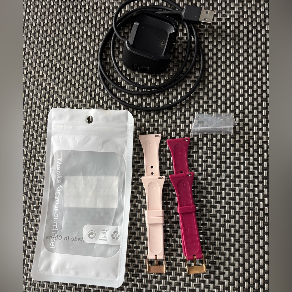 2 Fitbit Versa bands plus charger